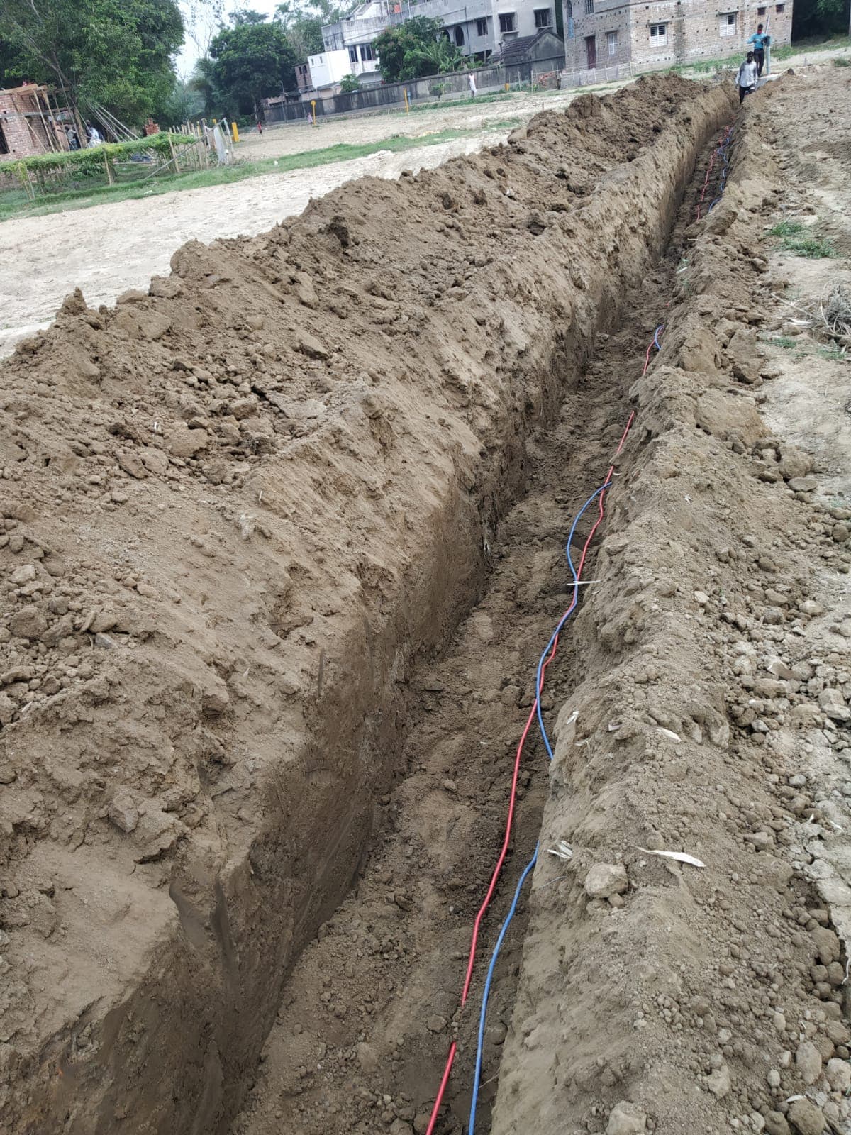 Cable being laid in an open trench for a B-type test lead point installation